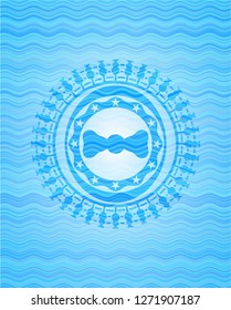 bow tie icon inside water wave emblem.