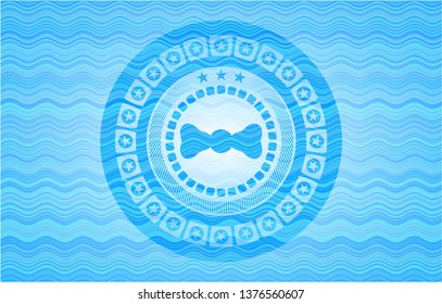 bow tie icon inside water emblem.