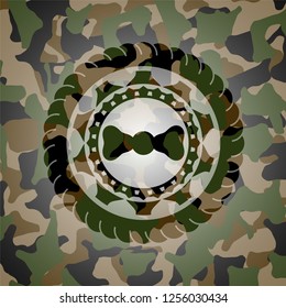 bow tie icon on camouflaged texture