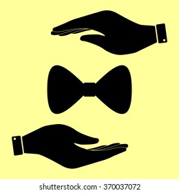 Bow Tie icon. Save or protect symbol by hands.