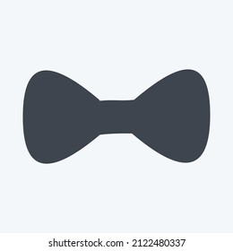 Bow Tie Icon in trendy glyph style isolated on soft blue background