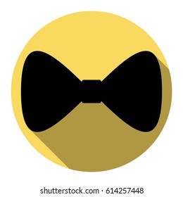 Bow Tie icon. Vector. Flat black icon with flat shadow on royal yellow circle with white background. Isolated.