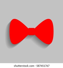 Bow Tie icon. Vector. Red icon with soft shadow on gray background.