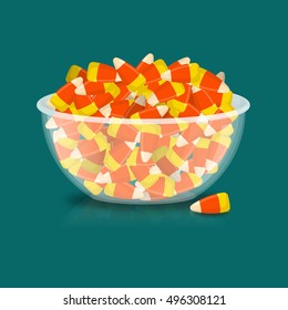 Bowl and candy corn. Sweets on plate. Traditional Treats for Halloween
