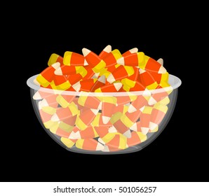 Bowl and candy corn. Sweets on plate. Traditional Treats for Halloween
