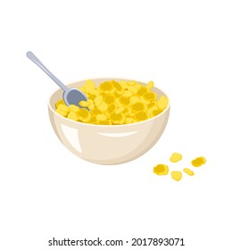 A bowl of cornflakes and a spoon. Fast food breakfast or snack. Delicious sweet corn product.