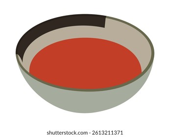 A bowl of red liquid is sitting on a white background