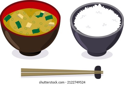 A bowl of rice and miso soup.