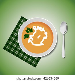 A bowl of soup with a spoon and a napkin