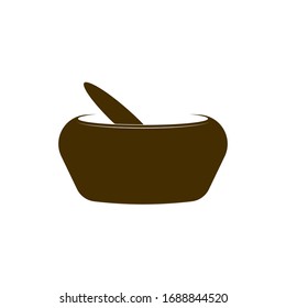 Bowl with spoon on a white background
