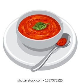 Bowl of tomato soup served with basil leaves