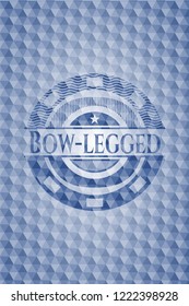 Bow-legged blue badge with geometric pattern.