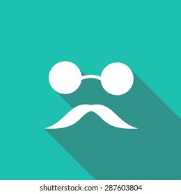 Bowler hat and moustache with a long shadow