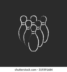 Bowling pins hand drawn in chalk on a blackboard vector white icon isolated on a black background.