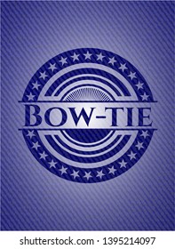 Bow-tie emblem with jean background. Vector Illustration. Detailed.