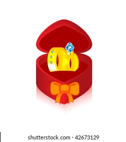 Box in the form of heart with two gold rings