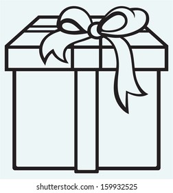 Box with a gift isolated on blue background