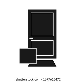 La caja con el pedido fue dejada por el mensajero cerca de la puerta. Icono de material del vector negro aislado en un fondo blanco. Concepto de cuarentena y prevención del coronavirus (COVID-19)