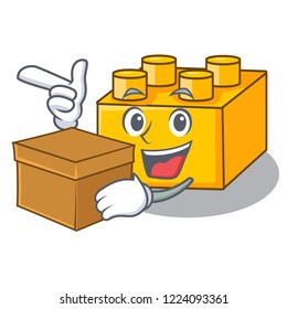 With box plastic shaped toy on construction character