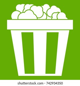 Box of popcorn icon white isolated on green background. Vector illustration