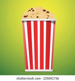 box of popcorn isolated on green background