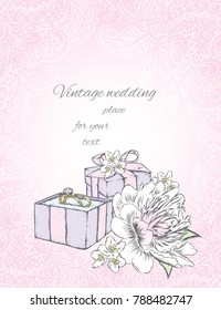 A box with a ring and flowers on a background of patterns. A gentle wedding card. Ready design. Vintage and retro. Love and wedding. Wedding rings.
