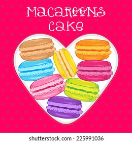 box in the shape of a heart with colorful macaroons cake