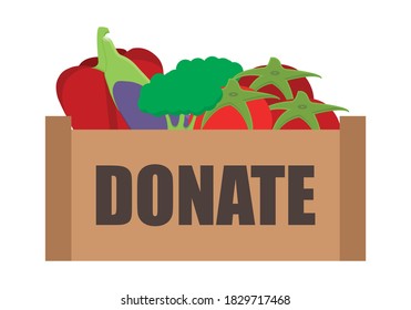 Box of vegetables to donate on white background.