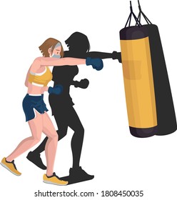 Boxer girl practicing by punching a sandsack at gym