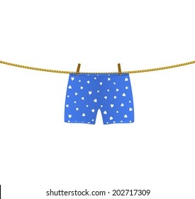 Boxer Shorts With White Hearts Hanging On Rope