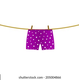 Boxer Shorts With White Hearts Hanging On Rope