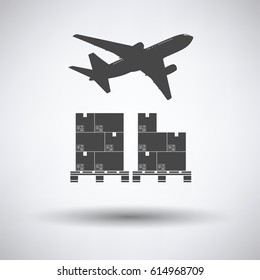 Boxes on pallet under airplane on gray background, round shadow. Vector illustration.