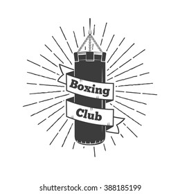 Boxing club and martial arts logo badge/label in vintage style with lighting rays and punching bag with ribbon. Vector illustration. Sport sign