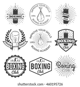 Boxing club and martial arts logo badge/label set in vintage style with boxing stuff. Vector illustration. Boxing school