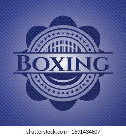 Boxing emblem with denim high quality background. Vector Illustration. Detailed.