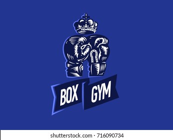 Boxing Gloves and Crown. Vector emblem. Engraving.
