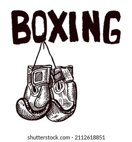 Boxing gloves hanging on title sketch isolated. Sporting equipment for boxing in hand drawn style. Engraved design for poster, print, book illustration, logo, icon, tattoo. Vintage vector illustration