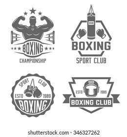 Boxing and martial arts, fighting club set of four vector monochrome labels, badges, emblems and logos isolated on white background