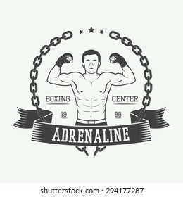 Boxing and martial arts logo, badge or label in vintage style. Vector illustration