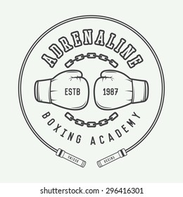 Boxing and martial arts logo, badge or label in vintage style. Vector illustration