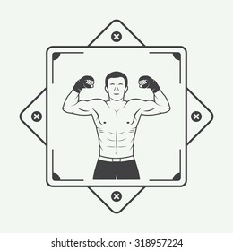Boxing and martial arts logo, badge or label in vintage style. Vector illustration