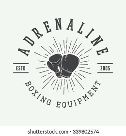 Boxing and martial arts logo, badge or label in vintage style. Vector illustration
