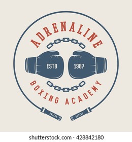 Boxing and martial arts logo, badge or label in vintage style. Vector illustration
