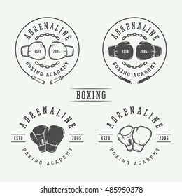 Boxing and martial arts logo badges and labels in vintage style. Vector illustration

