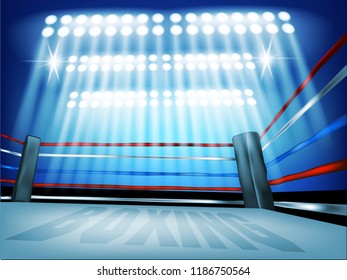 Boxing ring surrounded by ropes spotlit on and wind angle with blue background