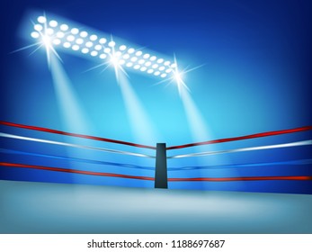 Boxing ring surrounded by ropes spotlit on and white smoke with blue background