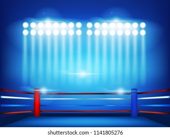 Boxing ring surrounded by spotlight on an isolated blue background