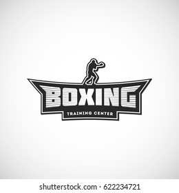 Boxing team logo. Training center emblem, logo, badge. Vector illustration with a fighter for your t-shirt, gym, label, combat store and sticker design