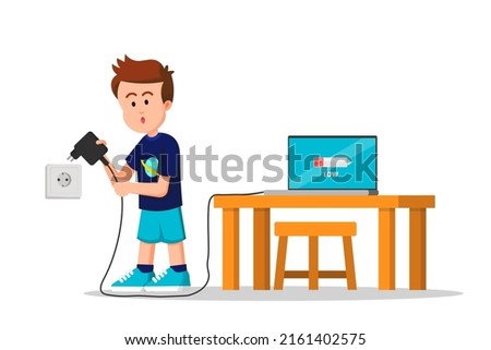 a boy is about to charge his laptop battery that has dropped