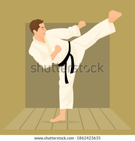 Boy with black belt practicing martial arts